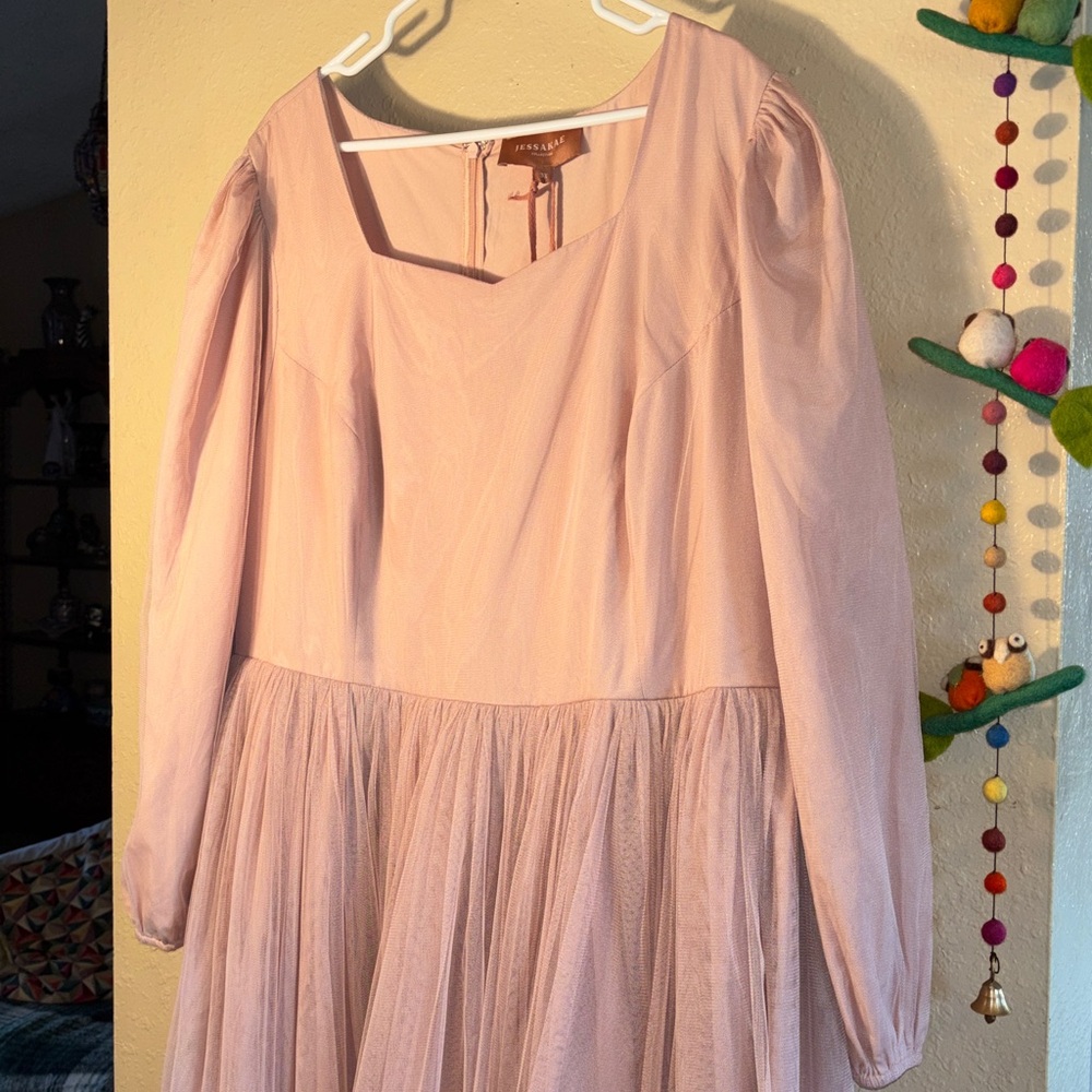 NWT JessaKae Allora Dress in Rose by the brand.
Color: Rose (a dusty pink)
Desi - Picture 5 of 11